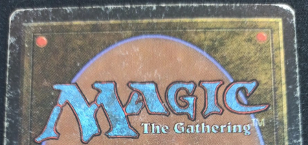 Reference photo of a card in Heavily Played condition